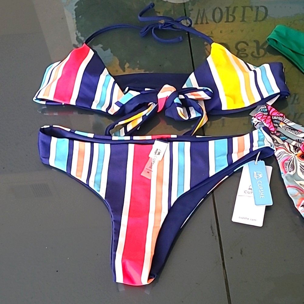 2 Bikini bottoms and Cupshe tie front bikini with matching bottom.